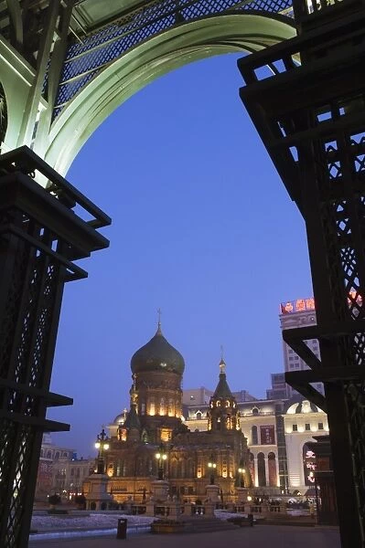 St. Sophia Russian Orthodox Church seen through arches illuminated at night