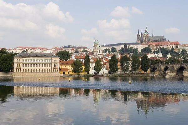 St. Vituss Cathedral, Royal Palace and castle reflected in River Vltava