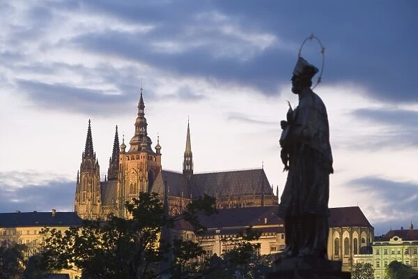 St. Vituss Cathedral, Royal Palace and Castle from Charles Bridge, with statue of St