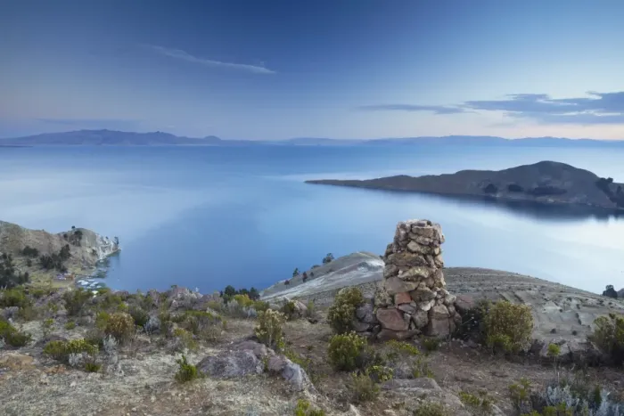 Framed Print : Stack of prayer stones on Isla del Sol (Island of the Sun) at sunset, Lake Titicaca, Bolivia, South America