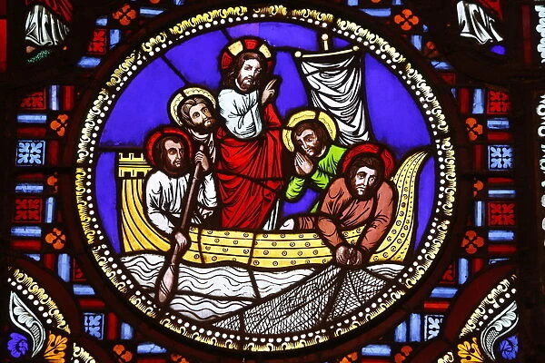 Stained glass of St. Peter fishing in Ainay Basilica, Lyon, Rhone, France, Europe