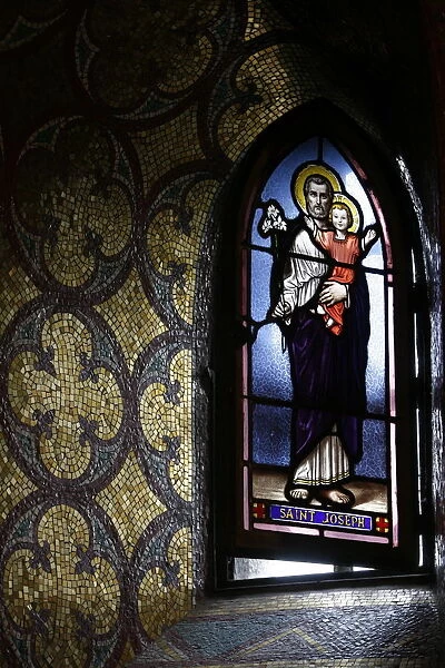 Stained glass window in the crypt of the Immaculate Conception Basilica, Lourdes