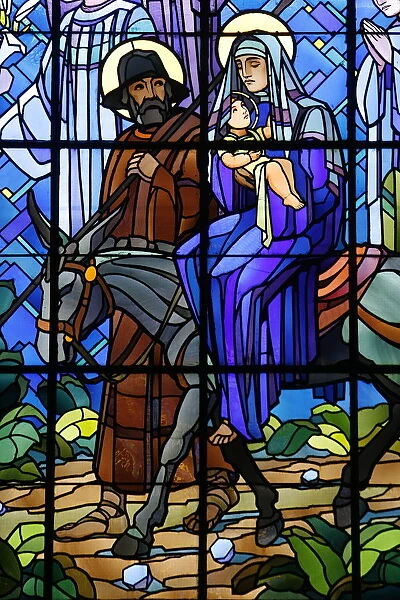 Stained glass window of the Flight into Egypt, in Chedde church, Haute Savoie, France