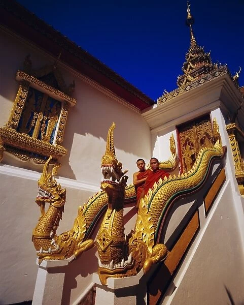 Staircase with Nagas (sacred snake) and two Buddhist monks