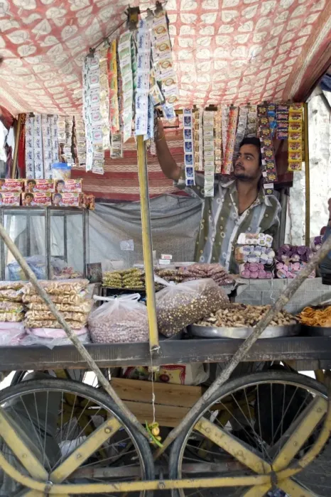 Framed Print : Stall holder selling gutka, namkeen snacks and bidi cigarettes, Kishangarh Framed Print : Stall holder selling gutka, namkeen snacks and bidi cigarettes, Kishangarh
