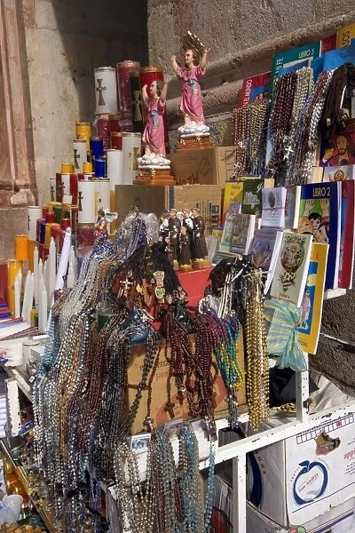 Stall selling Catholic paraphenalia at the entrance to the new Catedral de la Inmaculada Concepcion built in1885, Cuenca, Azuay Province, Southern Highlands, Ecuador