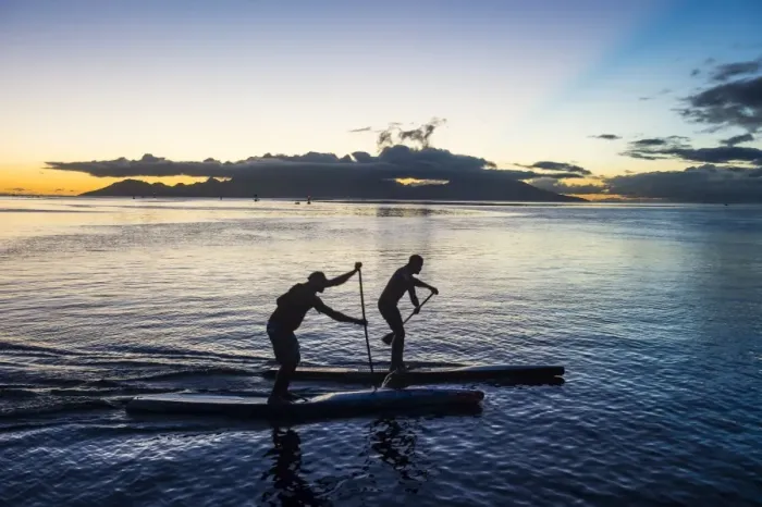 Framed Print : Stand up paddlers working out at sunset with Moorea in the background, Papeete, Tahiti Framed Print : Stand up paddlers working out at sunset with Moorea in the background, Papeete, Tahiti