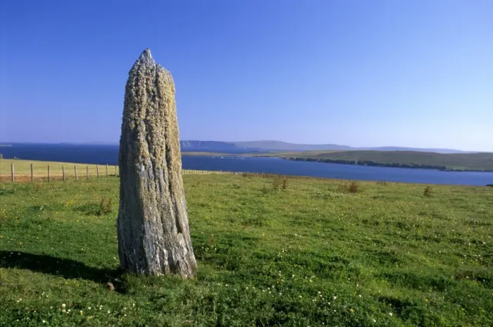 Framed Print : Standing stone near Clivocast (Uyeasound), looking east towards Fetlar in distance Framed Print : Standing stone near Clivocast (Uyeasound), looking east towards Fetlar in distance