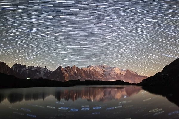 Star trail over Mont Blanc range seen from Lac des Cheserys, Parc Aiguilles Rouges