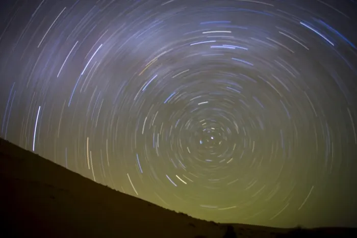 Framed Print : Star trails captured using an exposure time of two hours to record the rotation of the earth on its Polar Axis, stars are rotating around the Pole Star (Polaris), the Sahara Desert near Merzouga, Morocco, North Framed Print : Star trails captured using an exposure time of two hours to record the rotation of the earth on its Polar Axis, stars are rotating around the Pole Star (Polaris), the Sahara Desert near Merzouga, Morocco, North