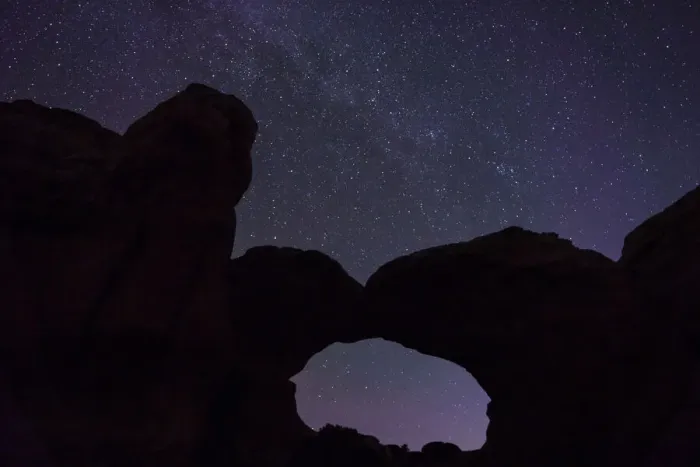 Framed Print : Starry sky viewed through Broken Arch, Arches National Park, Utah