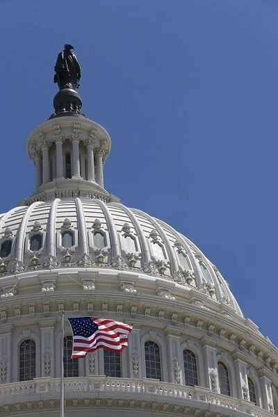 Stars and Stripes flag in front of the dome of the U. S. Capitol Building, Washington D