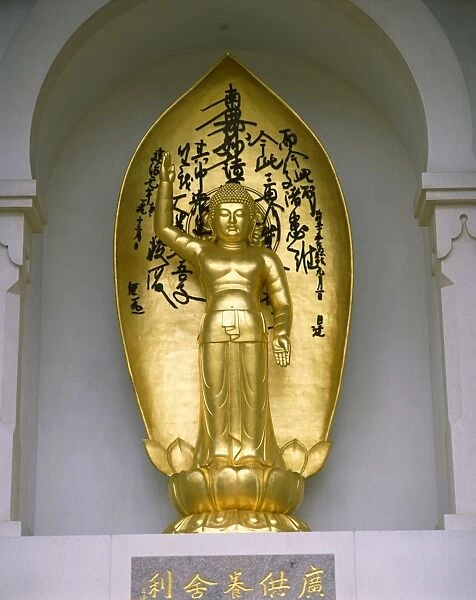 Statue of Buddha at the Buddhist Peace Pagoda, Battersea Park, London, England