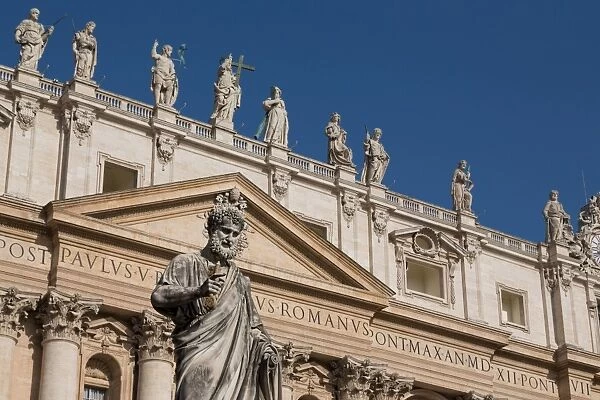 Statue and the facade of the Basilica of St. Peters, UNESCO World Heritage Site, Vatican, Rome, Lazio, Italy, Europe