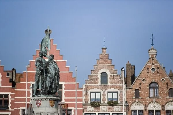 Statue and facades in Main Square (Markt), Bruges, Belgium, Europe