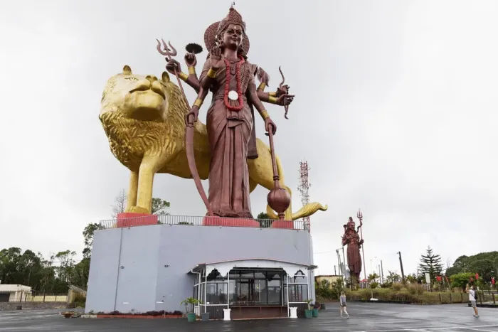 Framed Print : Statue of the Hindu goddess Durga, 108 feet tall, with her lion vehicle Manastala, at Ganga Talao, Mauritius, Indian Ocean, Africa Framed Print : Statue of the Hindu goddess Durga, 108 feet tall, with her lion vehicle Manastala, at Ganga Talao, Mauritius, Indian Ocean, Africa