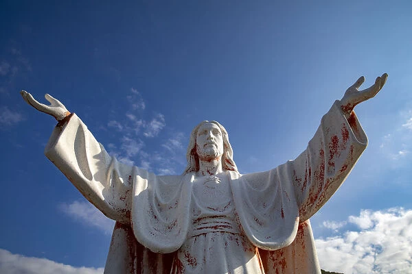 Statue of Jesus Christ with open arms in Delaj, Montenegro, Europe