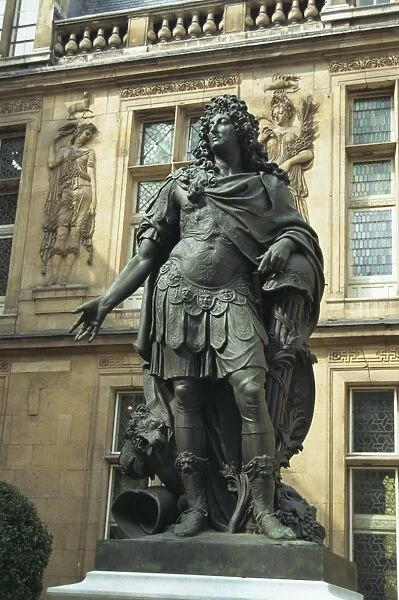 Statue of Louis XIV outside the Renaissance building of the Hotel Carnavalet