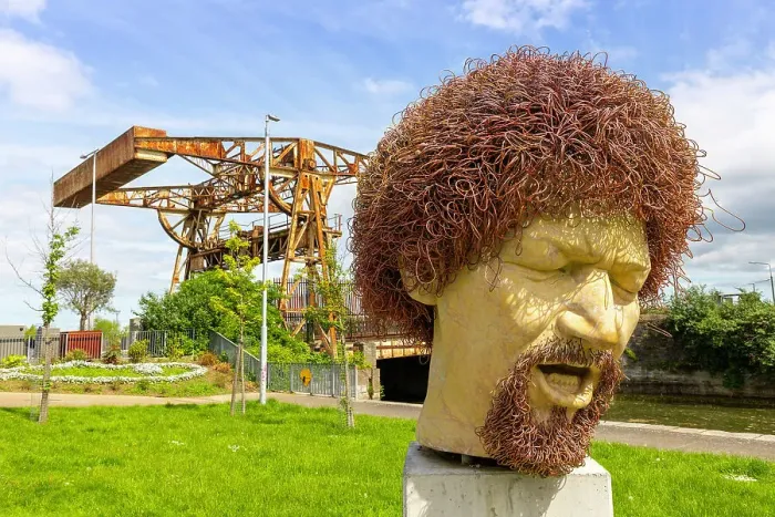 Framed Print : Statue of Luke Kelly, Sheriff Street Lifting Bridge in background, Linear Park, Dublin, Republic of Ireland, Europe Framed Print : Statue of Luke Kelly, Sheriff Street Lifting Bridge in background, Linear Park, Dublin, Republic of Ireland, Europe