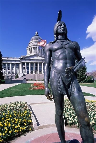Statue of Native American in front of State Capitol