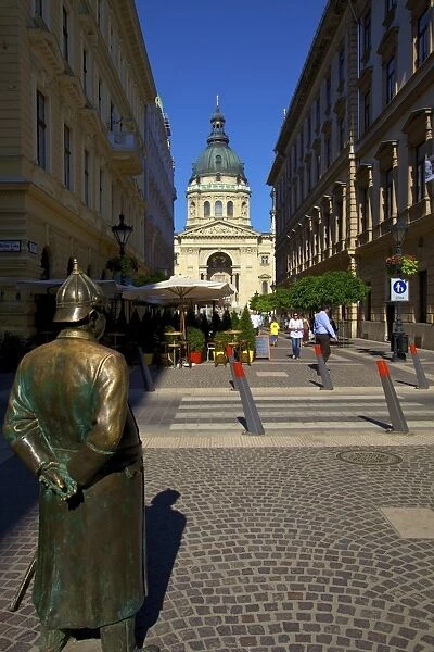 Statue of Policeman with St. Stephens Basilica, Budapest, Hungary, Europe