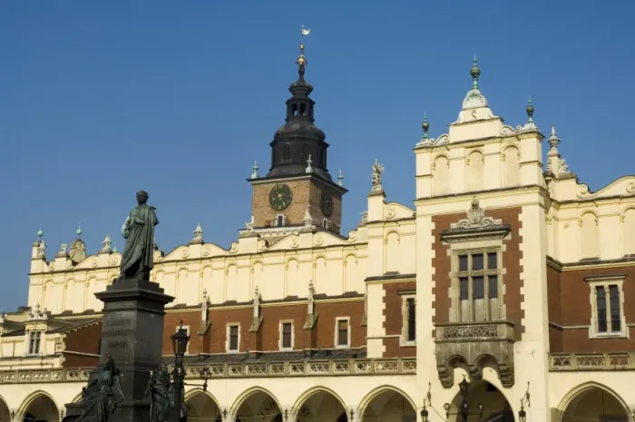 Framed Print : Statue of the romantic poet Mickiewicz in front of The Cloth Hall Framed Print : Statue of the romantic poet Mickiewicz in front of The Cloth Hall