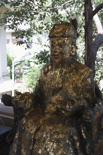 Statue at Sukhothai Traimit temple, Bangkok, Thailand, Southeast Asia, Asia