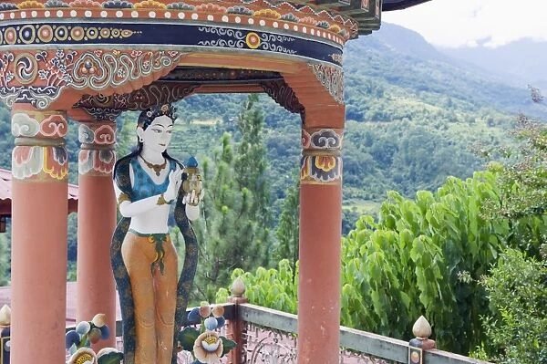 Statue at a water fountain, Khamsum Yuelley Namgyal Chorten built in 1999