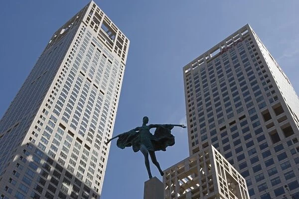 Statue of a woman among high office buildings in Guomao Central Business District, Beijing, China, Asia