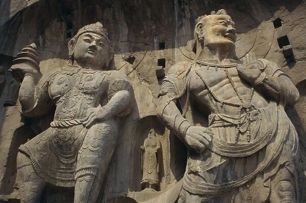 Statues carved in the rock at the Longmen Buddhist caves at Luoyang, UNESCO World Heritage Site