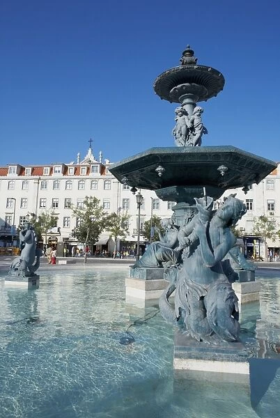Statues and fountain with elegant buildings beyond
