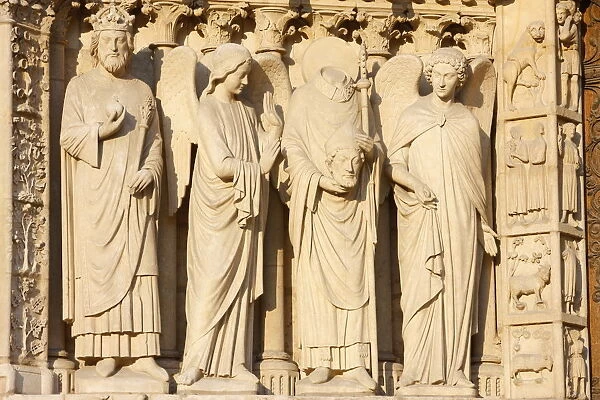 Statues including the Emperor Constantine and St. Denis carrying his head