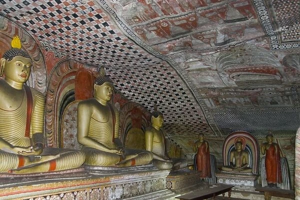 Statues and painted roof in natural cave in granite, Cave No 2, Maharaja Viharaya