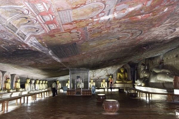 Statues and painted roof in natural cave in granite, Cave No 2, Maharaja Viharaya