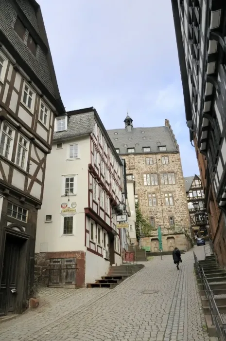 Framed Print : Steep narrow street in medieval city of Marburg, Hesse, Germany, Europe Framed Print : Steep narrow street in medieval city of Marburg, Hesse, Germany, Europe