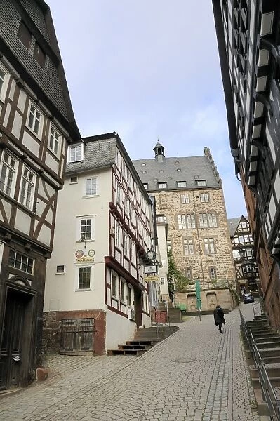 Steep narrow street in medieval city of Marburg, Hesse, Germany, Europe