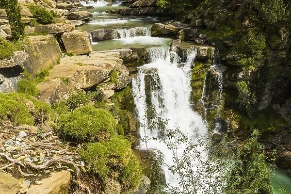 Steps of limestone strata make a waterfall on the Rio Arazas, upper Ordesa Valley