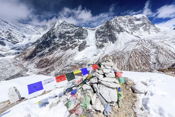 Framed Print : Stone Cairn Decorated with Prayer Flags on the Summit of Kyanjin Ri with Langtang Lirung Rising Above the Snowy Valley Framed Print : Stone Cairn Decorated with Prayer Flags on the Summit of Kyanjin Ri with Langtang Lirung Rising Above the Snowy Valley