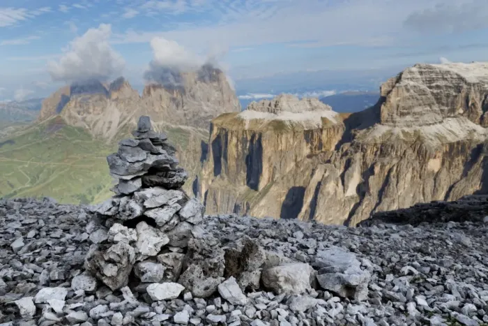 Framed Print : Stone cairn on Sass Pordoi mountain in the Dolomites near Canazei, with cloud covered Sassolungo mountains in the distance, Trentino-Alto Adige, Italy, Europe Framed Print : Stone cairn on Sass Pordoi mountain in the Dolomites near Canazei, with cloud covered Sassolungo mountains in the distance, Trentino-Alto Adige, Italy, Europe
