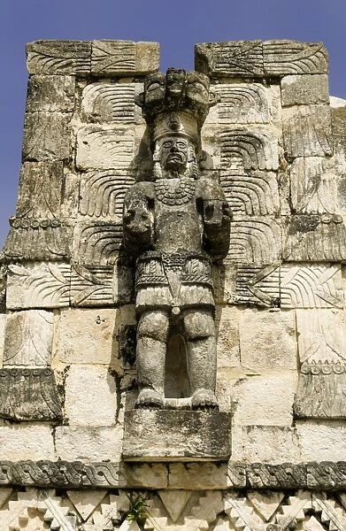 Stone carved Atlantes figures on the back of the Mayan ruins of El Palacio de las Mascarones at Kabah, in the Yucatan, Mexico, North America