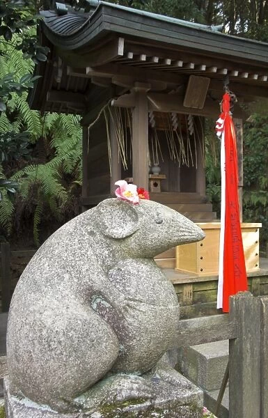 Stone mouse at small temple dedicated to mice