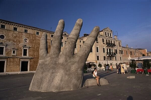 Stone sculpture of hand on Riva Degli Schiavoni