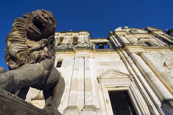 Stone statue of a lion outside Leon Cathedral, Basilica de la Asuncion