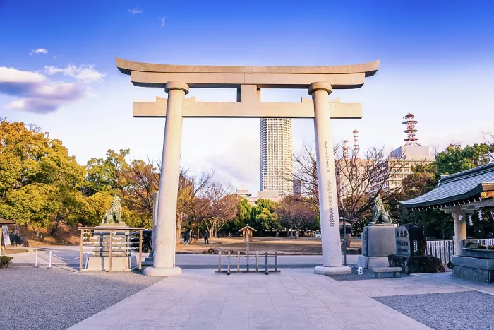 Framed Print : Stone Torii Gate at the Shinto shrine. Evening light at Hiroshima Gokoku Shrine, Hiroshima, Japan