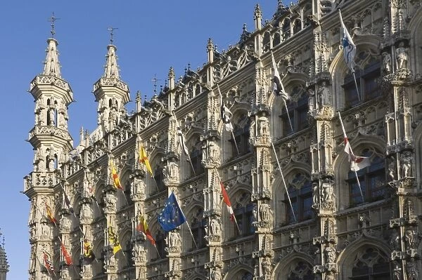 A detail of the stonework carving on the 15th century late Gothic Town Hall, Grote Markt, Leuven, Belgium, Europe