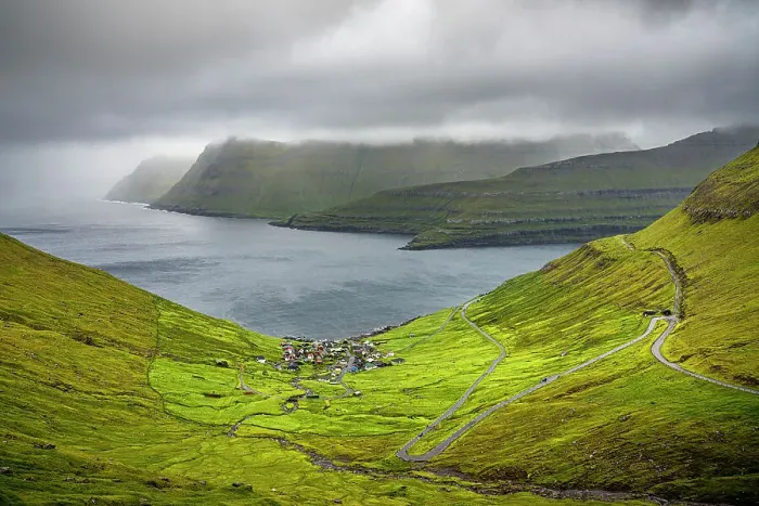 Framed Print : Storm clouds over the coastal village of Funningur along the fjord, Eysturoy Island, Faroe Islands, Denmark, Europe Framed Print : Storm clouds over the coastal village of Funningur along the fjord, Eysturoy Island, Faroe Islands, Denmark, Europe