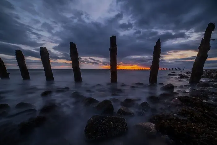 Framed Print : Storm clouds gather over the Irish Sea, worn sea defences from South Walney at sunset from the Cumbrian Coast, Cumbria, England, United Kingdom, Europe Framed Print : Storm clouds gather over the Irish Sea, worn sea defences from South Walney at sunset from the Cumbrian Coast, Cumbria, England, United Kingdom, Europe
