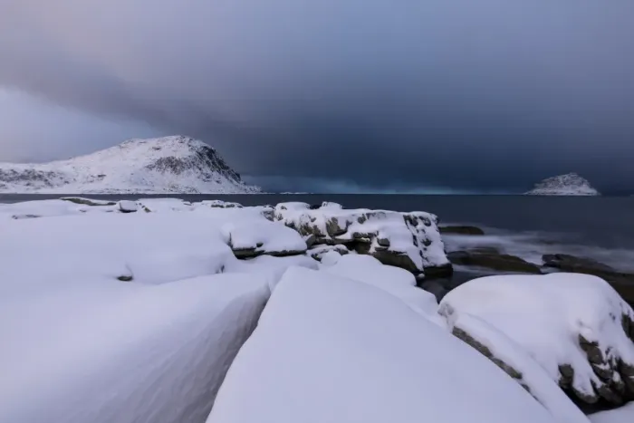Framed Print : Storm clouds on the snowy peaks reflected in the cold sea at night, Haukland, Lofoten Islands Framed Print : Storm clouds on the snowy peaks reflected in the cold sea at night, Haukland, Lofoten Islands
