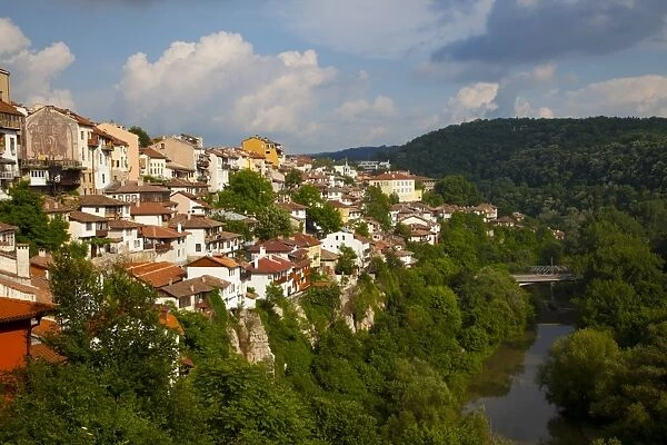 Stormy weather at dusk over hillside houses above the Yantra River, Veliko Tarnovo
