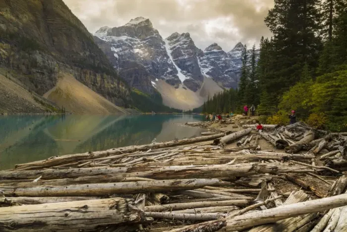 Framed Print : Stormy weather and visitors exploring at Moraine Lake, Banff National Park, UNESCO Framed Print : Stormy weather and visitors exploring at Moraine Lake, Banff National Park, UNESCO